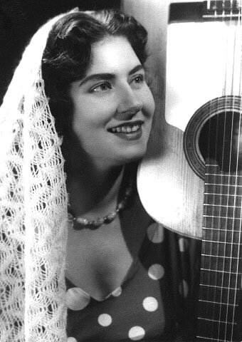 Posing in Mexico with her guitar