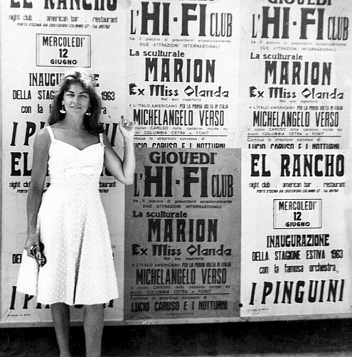 Marion with publicity banners on the wall - Ischia 1963